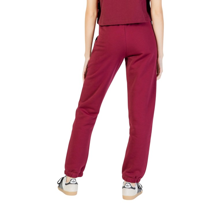 Icon pantalón deportivo de mujer burdeos vista posterior