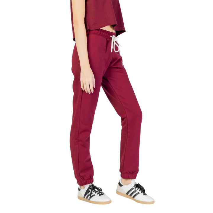 Icon pantalón deportivo de mujer burdeos vista lateral