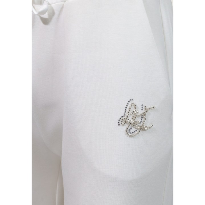 Detalle del logo de Liu-Jo en pantalón blanco de jersey para mujer