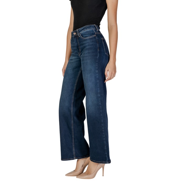 Only vaqueros de mujer en denim oscuro vista lateral
