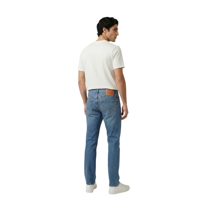 Levi's 511 Slim Waterfall Cool vaqueros de hombre en denim azul vista posterior de tres cuartos