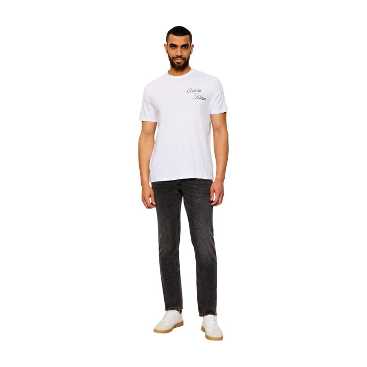 Calvin Klein Jeans vaqueros de hombre gris oscuro de algodón vista frontal con modelo