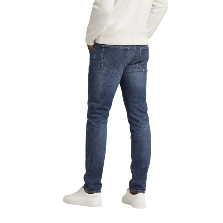 Tommy Hilfiger Jeans vaqueros Scanton Slim de hombre en denim azul vista posterior