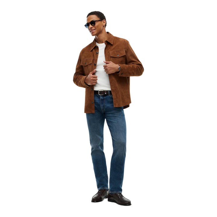 Tommy Hilfiger vaqueros de hombre Denton Slim Straight en denim azul oscuro vista tres cuartos