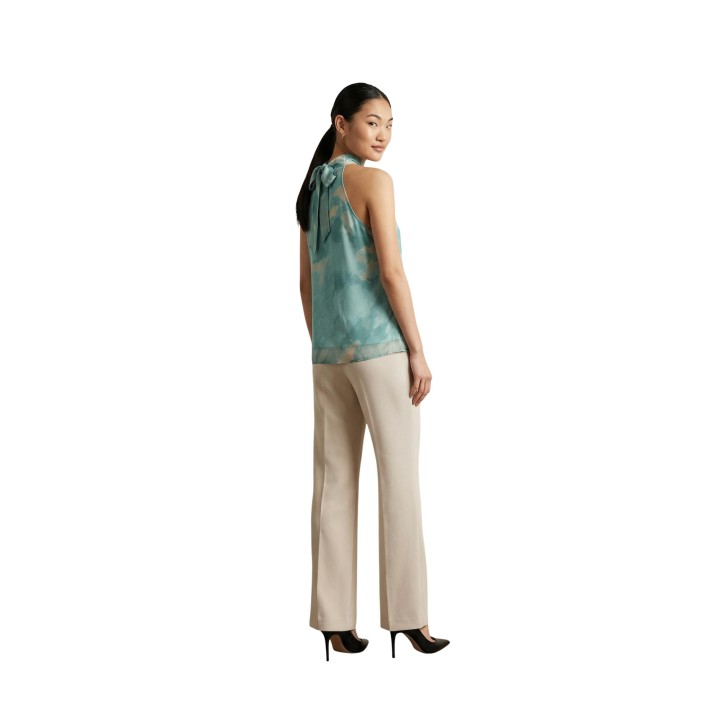 Camiseta de mujer Artigli color menta estampada vista posterior de tres cuartos completa