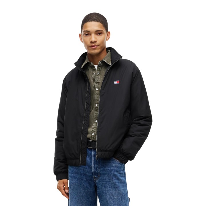 Tommy Hilfiger Jeans chaqueta acolchada negra de hombre vista frontal de tres cuartos
