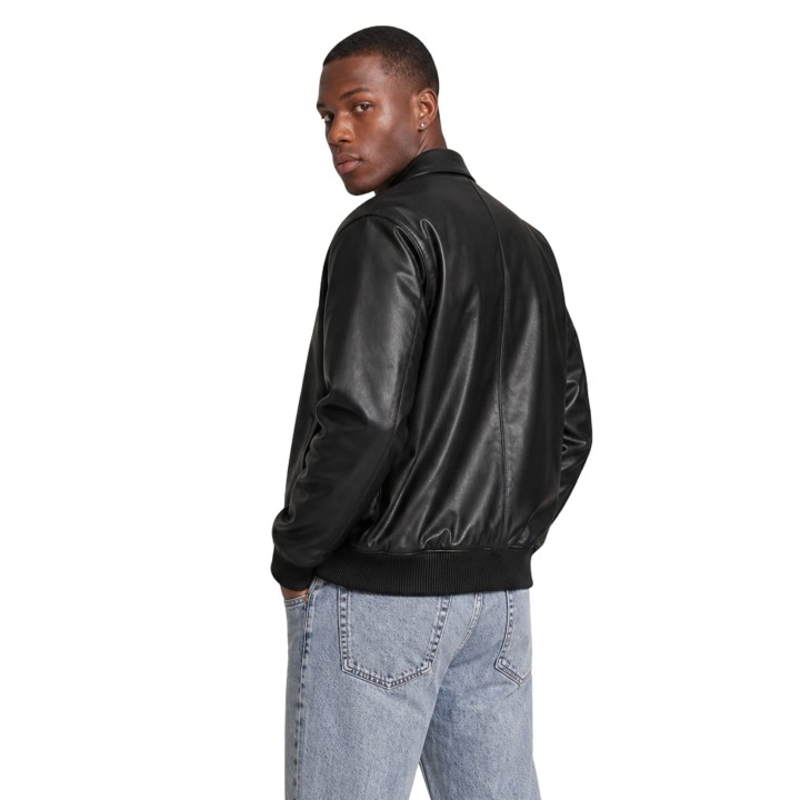 Calvin Klein Jeans chaqueta de hombre negra de piel vista posterior de tres cuartos