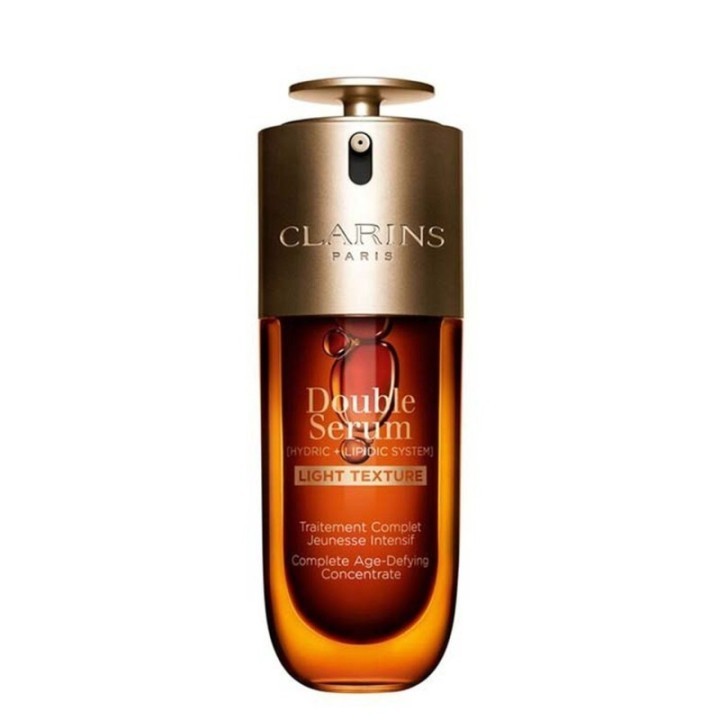 Sérum facial Clarins Double Serum Light en envase ámbar con tapa dorada vista frontal
