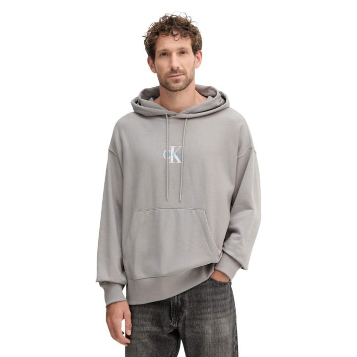 Sudadera Calvin Klein Jeans de hombre gris de terry con capucha vista frontal de tres cuartos