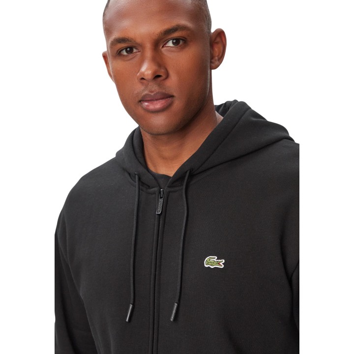 Detalle de sudadera negra con capucha Lacoste para hombre SH8864