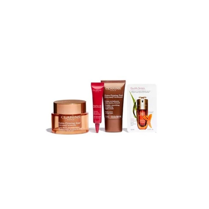 Lote Clarins extra-firming para piel normal con crema facial y tratamientos en envases dorados