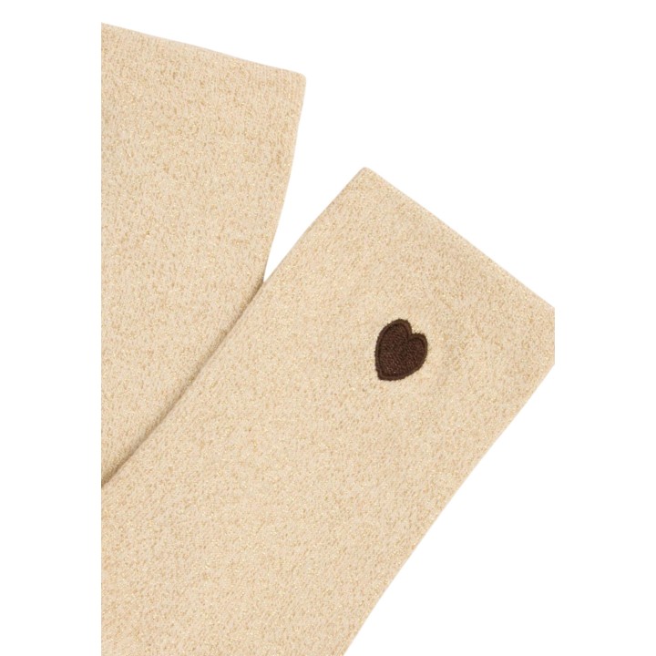 Detalle de calcetines de mujer Morgan De Toi dorados con corazón marrón