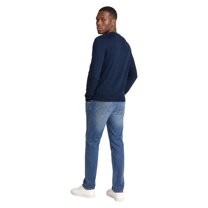 Jersey Calvin Klein de hombre azul de lana merino vista posterior tres cuartos