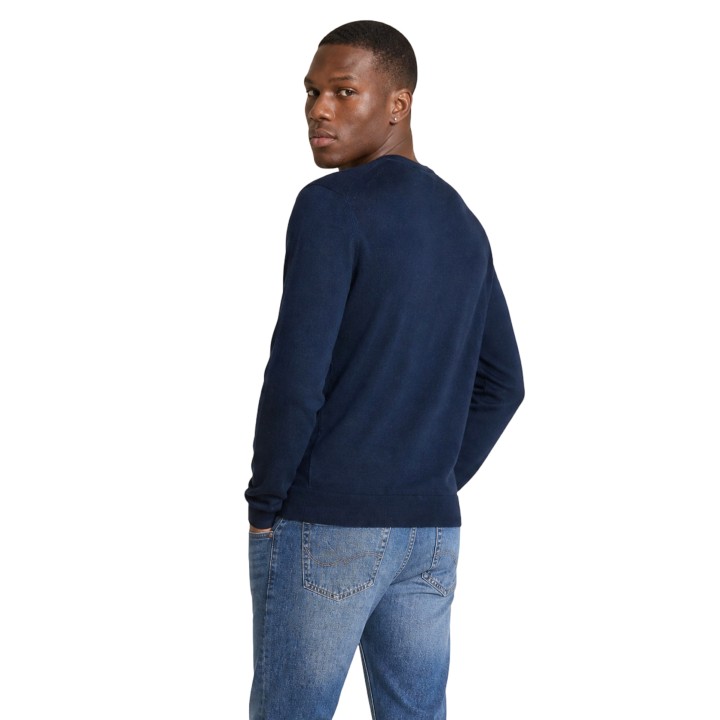 Detalle posterior tres cuartos del jersey Calvin Klein de hombre azul de lana merino