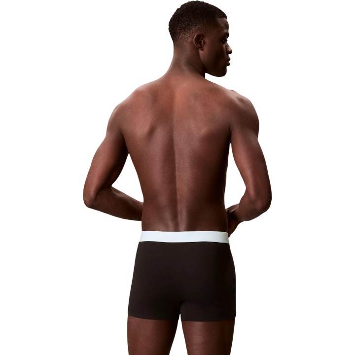 Bóxer Calvin Klein Underwear negro para hombre con cinturilla blanca vista posterior