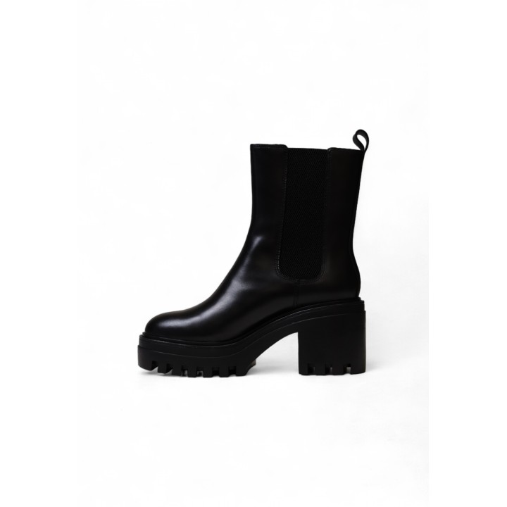 Botín Chelsea negro de tacón para mujer Calvin Klein YW0YW01547 vista lateral