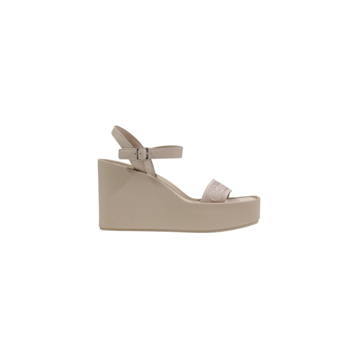 Sandalia de cuña Calvin Klein para mujer en beige vista lateral