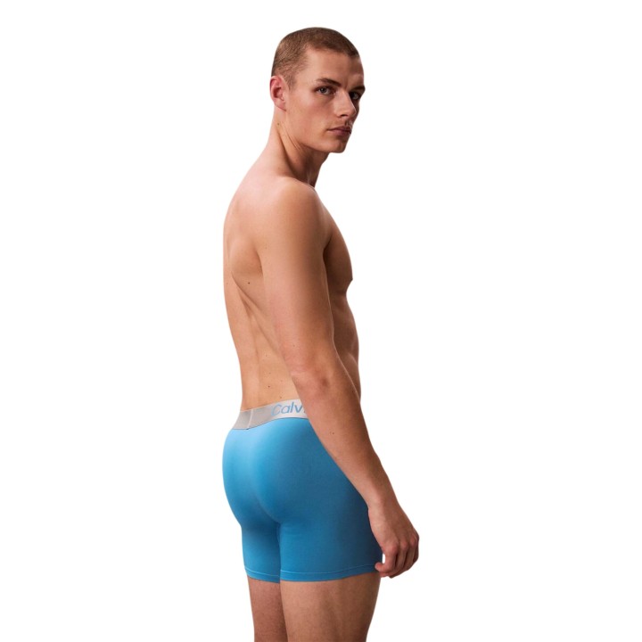 Calvin Klein Underwear bóxer de hombre azul vista de tres cuartos posterior