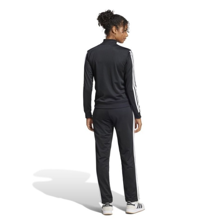 Chándal negro para mujer adidas vista trasera con las tres franjas blancas