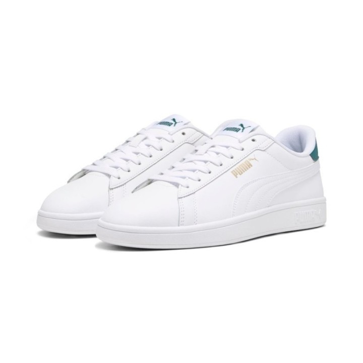 Zapatillas Puma blancas para hombre vista trescuartos con logo dorado y talon verde