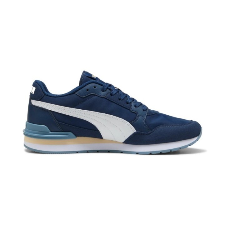 Zapatillas Puma para hombre azul marino con banda blanca vista lateral