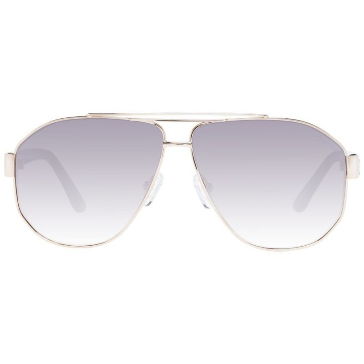 Gafas de sol Guess para mujer montura metálica dorada con lentes gris degradado vista frontal