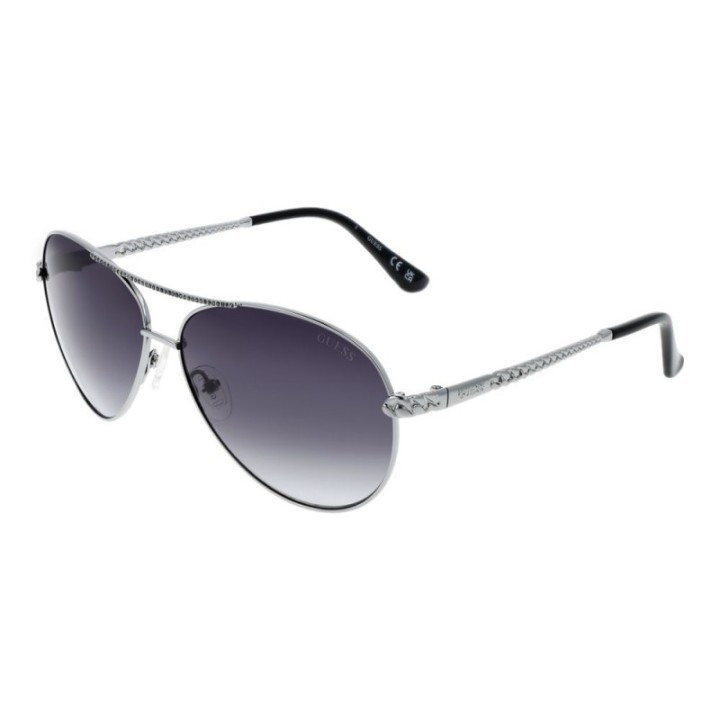 Gafas de sol aviador plateadas para mujer Guess con lentes degradadas azules vista lateral