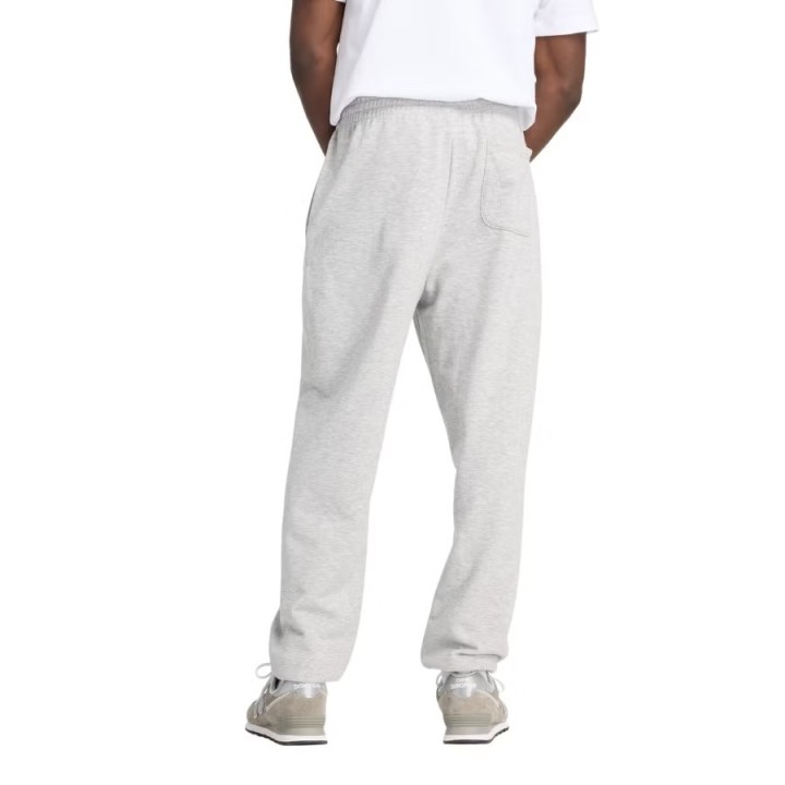Pantalón New Balance Sport Essentials French Terry gris