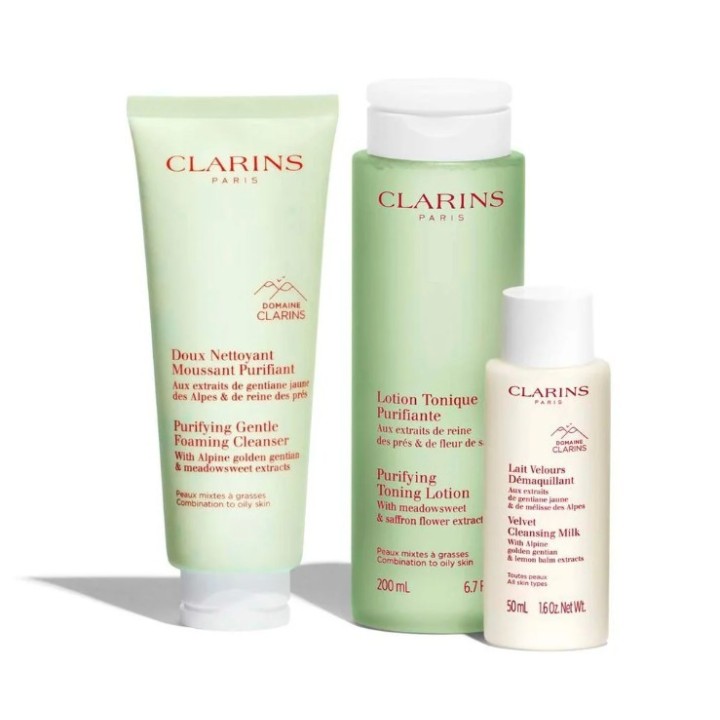 Set de limpieza facial clarins para piel grasa con neceser beige detalle de productos