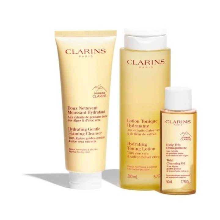 Set de limpieza facial Clarins para piel normal con neceser beige detalle productos