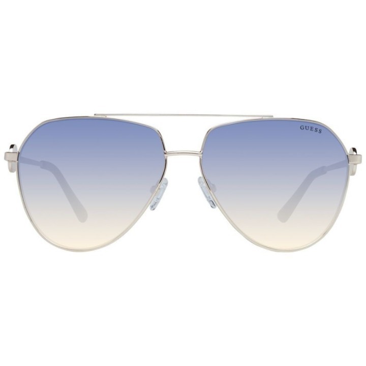 Gafas de sol Guess doradas de metal para mujer vista frontal con lentes degradadas