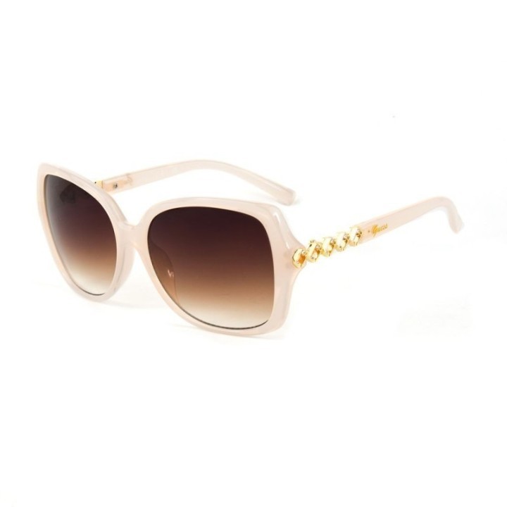 Gafas de sol de resina marron para mujer Guess vista lateral