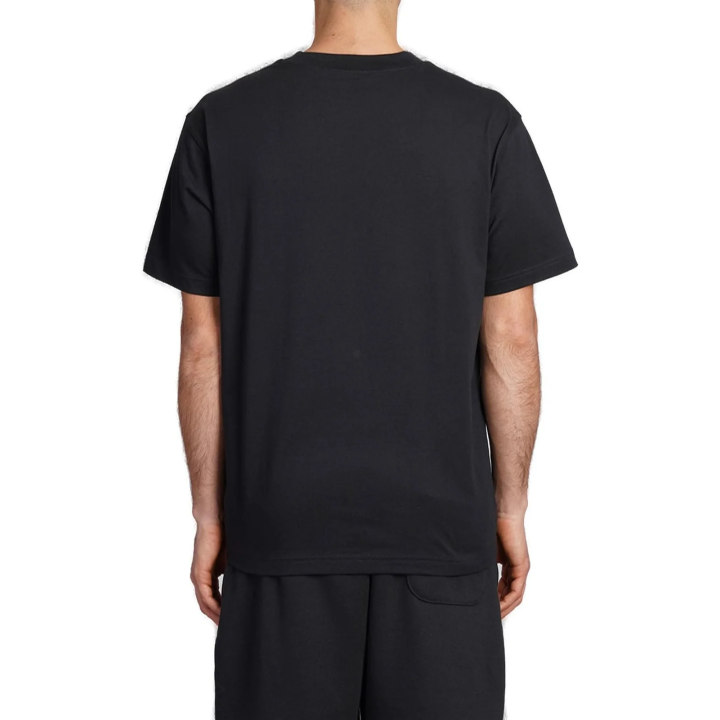 Camiseta New Balance Sport Essentials algodón negro vista dorsal