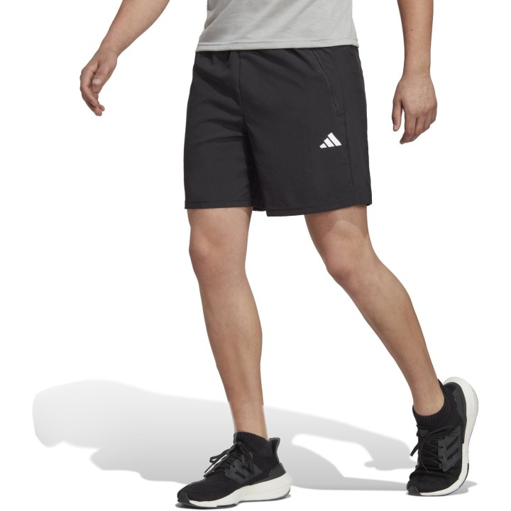 Shorts deportivos negros para hombre adidas vista frontal general con logo blanco