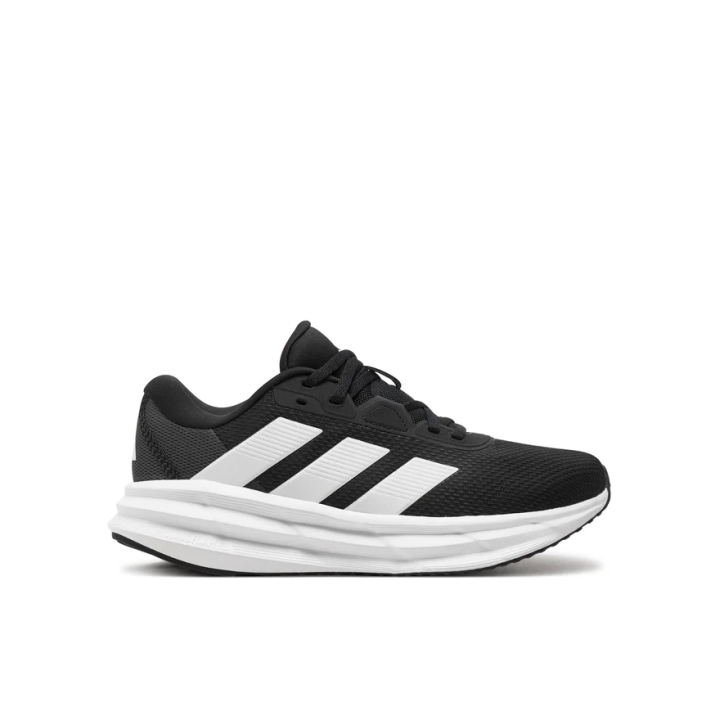 Zapatillas Adidas Galaxy 7 running negras blancas vista lateral