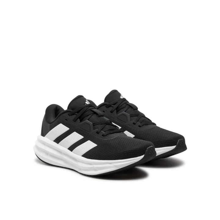 Zapatillas Adidas Galaxy 7 running negras blancas vista trescuartos
