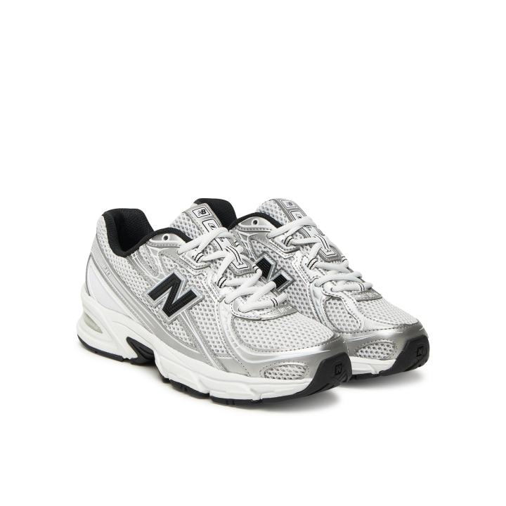 Zapatillas New Balance 740 casual blanco plata vista lateral tres cuartos