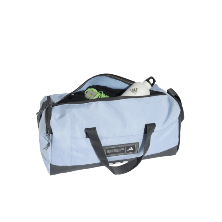 Interior de la bolsa de deporte Adidas pequeña azul y blanca
